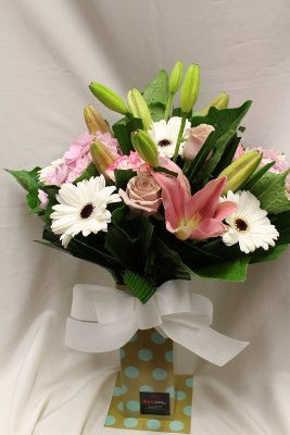 Pastel temporary vase arrangement - florist choice